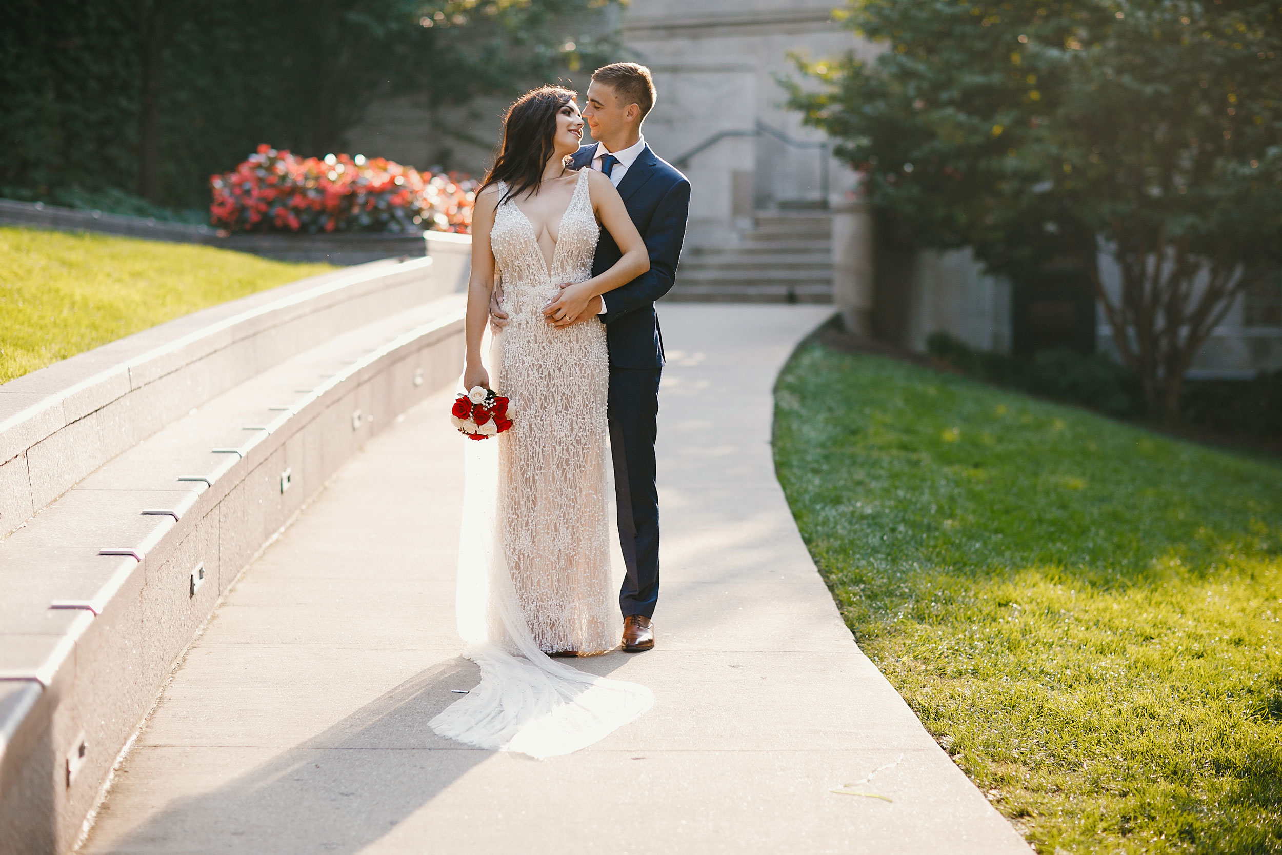 married couple posing outside of venue